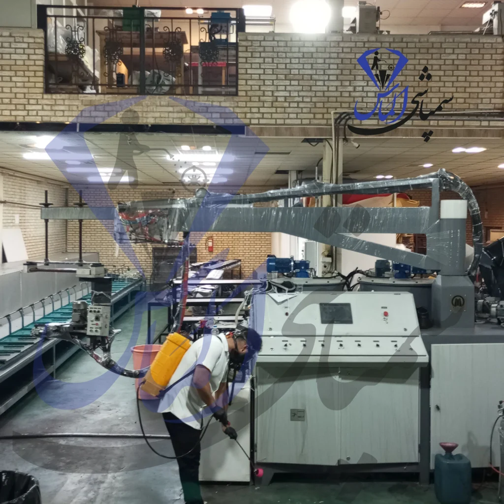 Industrial worker performing سمپاشی کنه کبوتری in a factory setting for pest control.